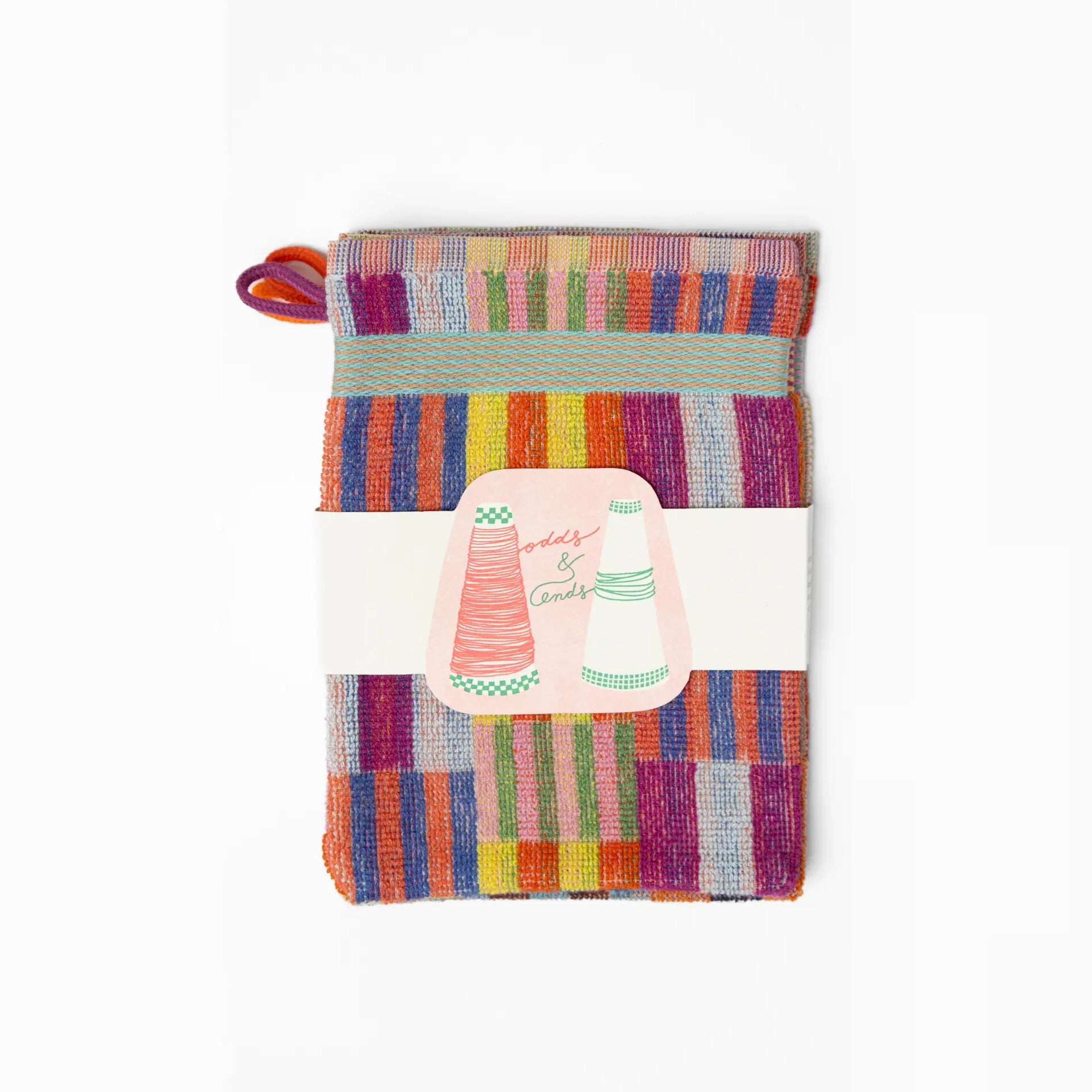 3 pack wash cloths by Foekje Fleur. Colorful cotton textile made from leftover yarns, featuring unique woven color combinations and a hanging label, photographed folded on a neutral background.