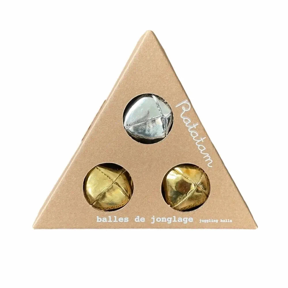 A set of three juggling balls in metallic gold and silver, tailored for small hands and ideal for beginners, made from durable leatherette with a non-roll design.