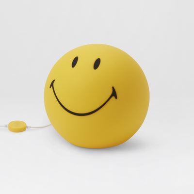 Smiley Star Light, a 25cm dimmable LED table lamp by Mr Maria, designed for a warm and cheerful atmosphere.