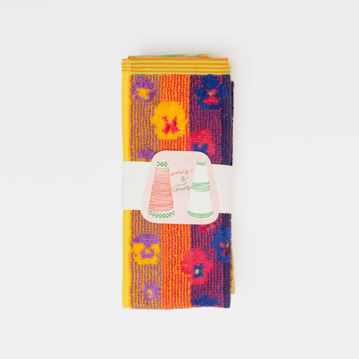 Set of two sustainable colorful guest towels with pansy pattern made from leftover cotton yarns with velour finish – made in Portugal