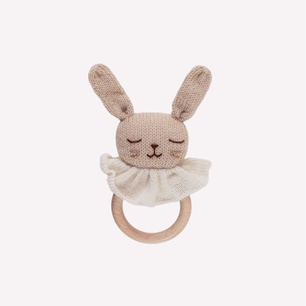 Hand-knitted bunny teether with natural maple wood ring, made of pure baby alpaca wool by Main Sauvage, hypoallergenic and perfect for sensitive skin.