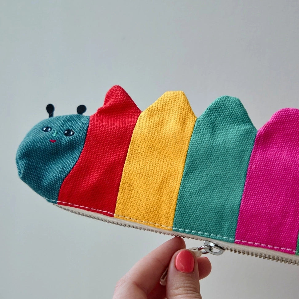 Donna Wilson Casey Caterpillar Pencil Case – colourful cotton pencil case in the shape of a caterpillar with metal zip and soft cotton pull