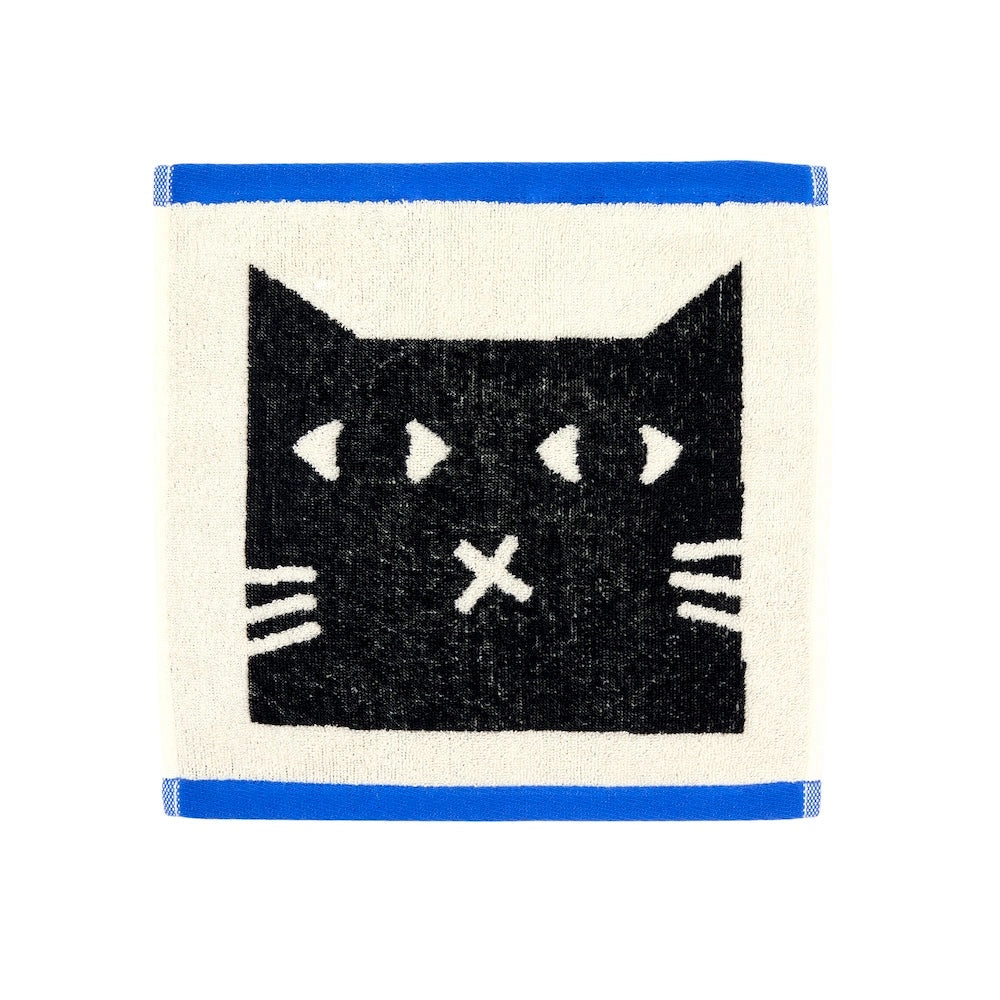 Donna Wilson Lazy Cat Face Cloth – super soft 100% cotton jacquard face cloth featuring a playful lazy cat design, made in Portugal
