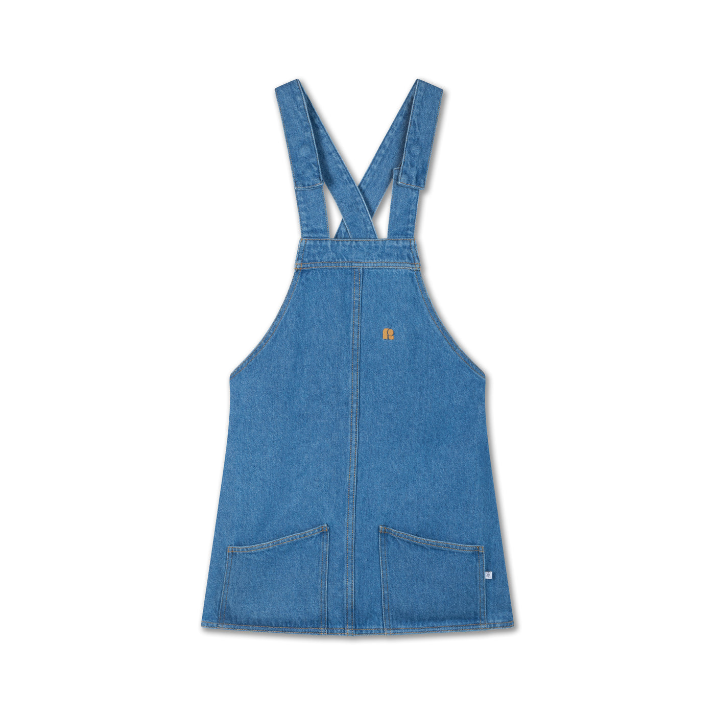 Medium blue dungaree dress made from durable organic cotton denim. Features adjustable snap-button shoulder straps, front and back patch pockets, A-line skirt, embroidered logo, and woven brand tag.