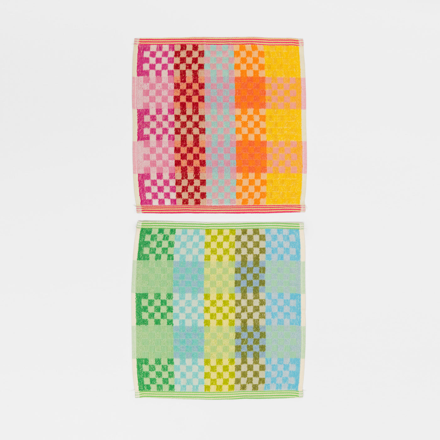 Colorful checkered cotton cloth 2 pack  from Foekje Fleur's Wild Weave collection, featuring a mix of vibrant, unplanned colors. Square shape (30 x 30 cm) with a visible hanging loop, woven from thick, high-quality cotton. Made sustainably in Portugal using leftover dyed yarns.