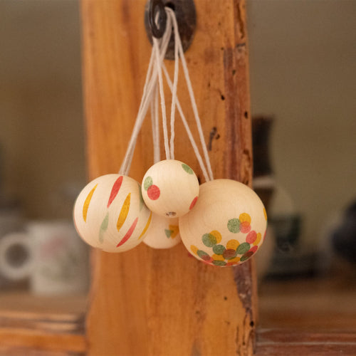 Set of 5 hand-painted Grapat wooden wonder balls with threads for hanging, perfect for holiday decor, party decorations, or adding charm to trees, walls, and windows.