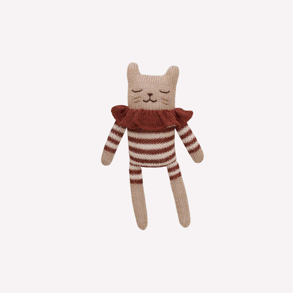 Knitted kitten soft toy with striped romper and collar, hand-knitted in pure baby alpaca wool by Main Sauvage, hypoallergenic and perfect for sensitive skin.