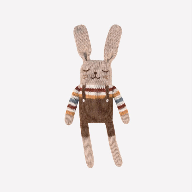 Knitted bunny toy with big ears and a cute striped outfit, hand-knitted in pure baby alpaca wool by Main Sauvage, hypoallergenic and suitable for sensitive skin.