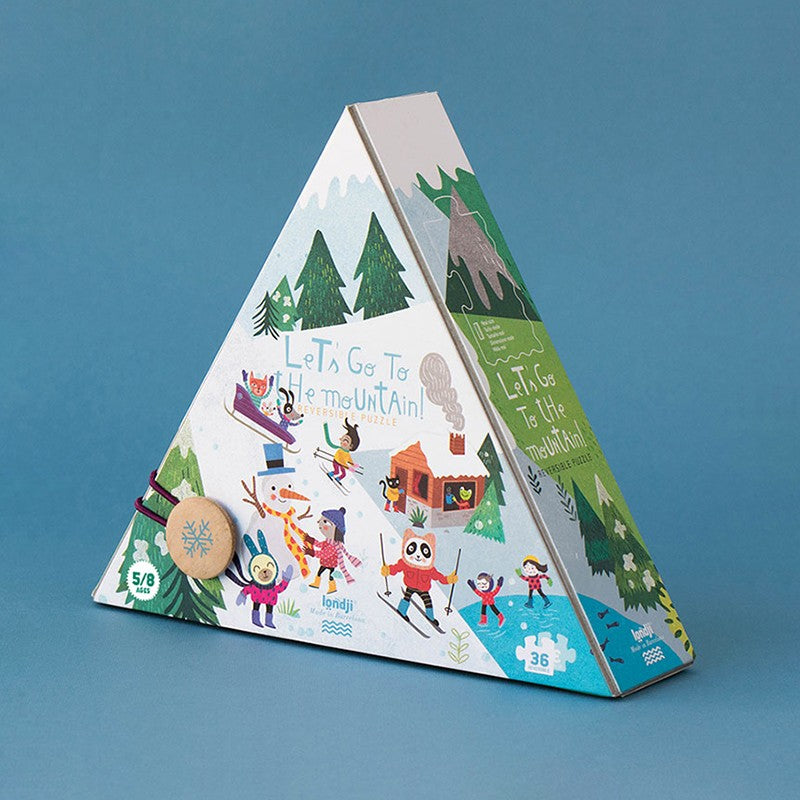 Londji Let's Go to the Mountain – 36-piece reversible puzzle for kids featuring winter and summer mountain adventures, illustrated by Mariana Ruiz Johnson.