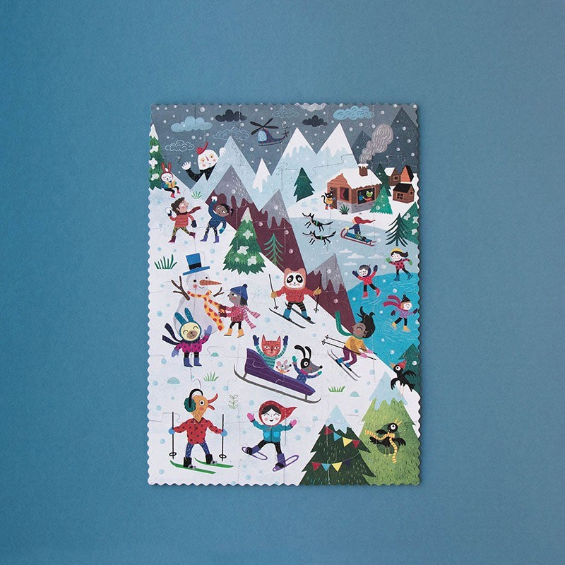 Londji Let's Go to the Mountain – 36-piece reversible puzzle for kids featuring winter and summer mountain adventures, illustrated by Mariana Ruiz Johnson.