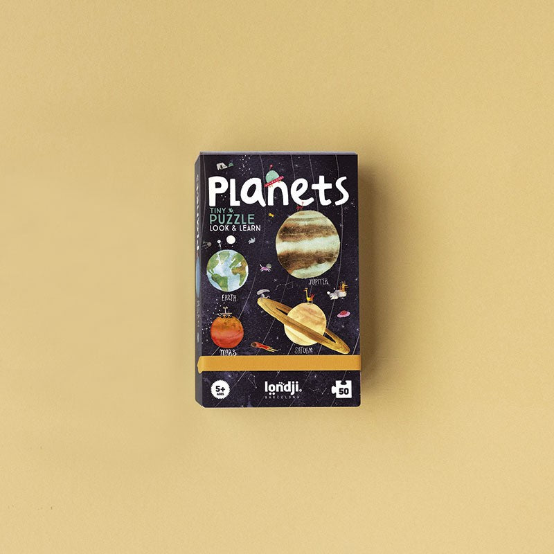 Londji Planets Tiny Puzzle – 50-piece eco-friendly educational jigsaw for children about planets and space, made in Barcelona from recycled materials, illustrated by Carmen Saldaña.