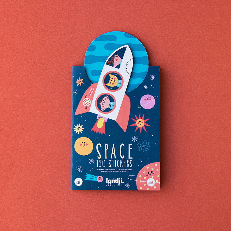 Londji Space Stickers Set 6 – reusable sticker set with 150 space-themed stickers featuring rockets, planets and stars, made in Barcelona, illustrated by Teresa Bellón.