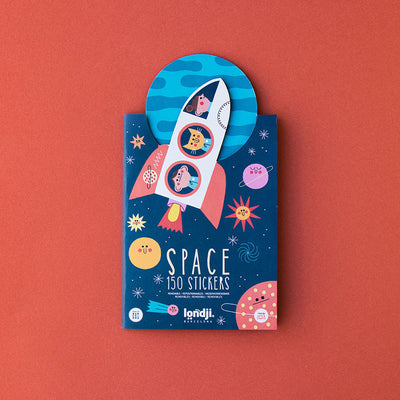 Londji Space Stickers Set 6 – reusable sticker set with 150 space-themed stickers featuring rockets, planets and stars, made in Barcelona, illustrated by Teresa Bellón.