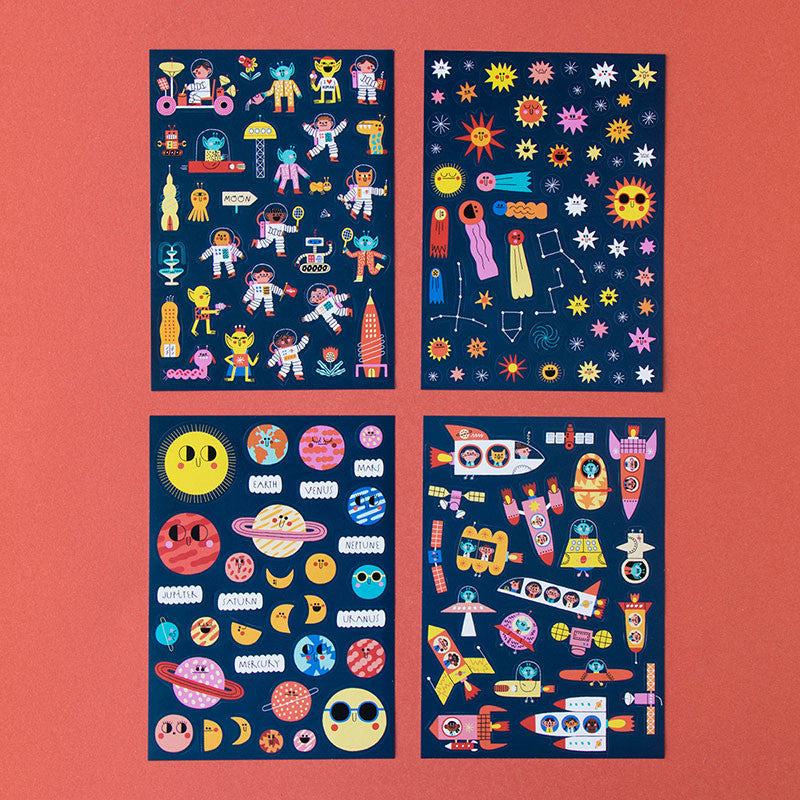 Londji Space Stickers Set 6 – reusable sticker set with 150 space-themed stickers featuring rockets, planets and stars, made in Barcelona, illustrated by Teresa Bellón.