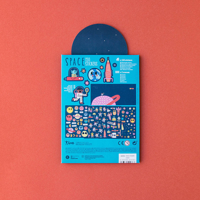 Londji Space Stickers Set 6 – reusable sticker set with 150 space-themed stickers featuring rockets, planets and stars, made in Barcelona, illustrated by Teresa Bellón.