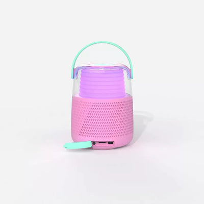 KS-80 Bluetooth Speaker in pink, featuring powerful sound, light effects, and a wireless microphone with fun voice effects, perfect for parties and karaoke.