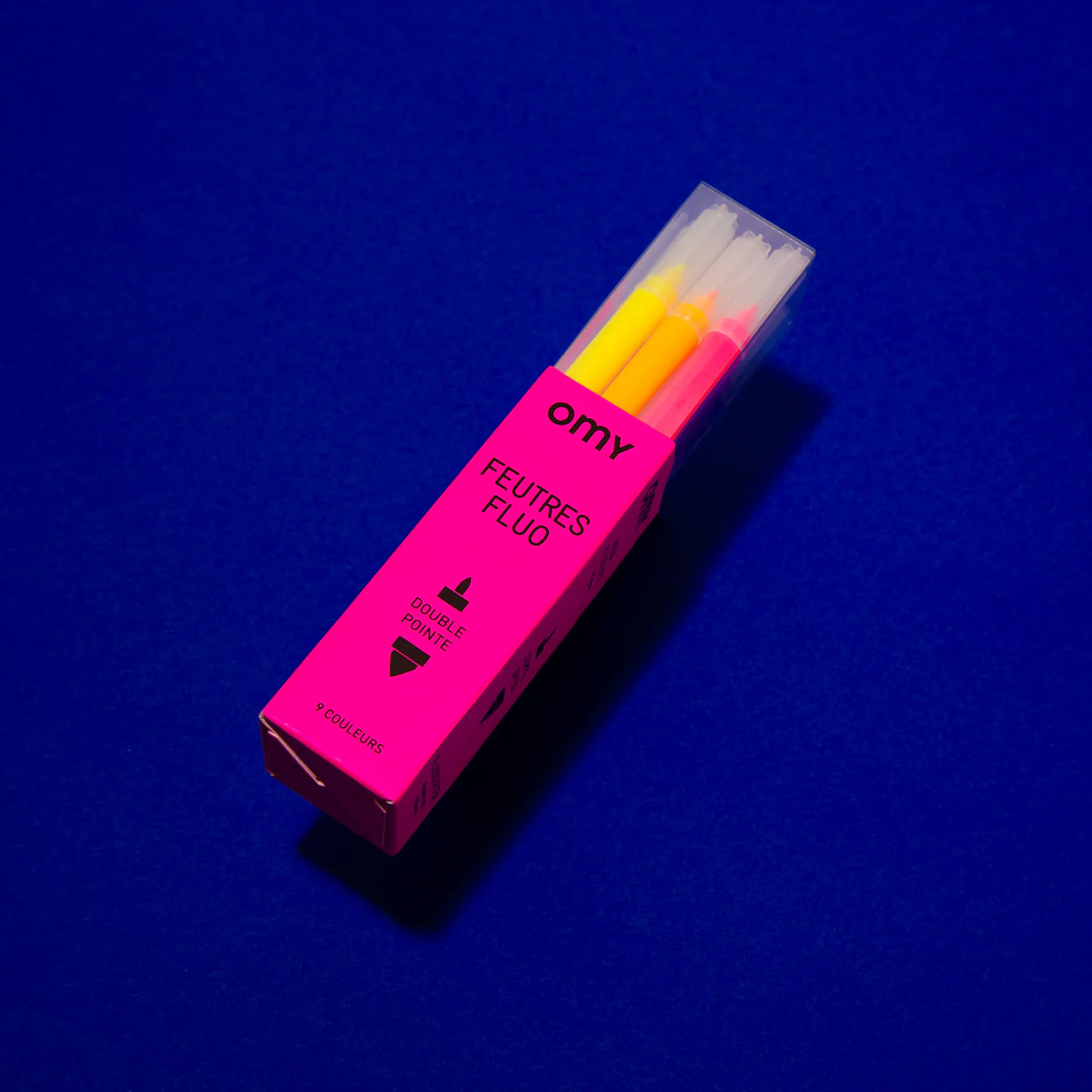 Set of 9 OMY double-tipped felt pens in bright and neon colors, with reusable box that transforms into a pencil holder