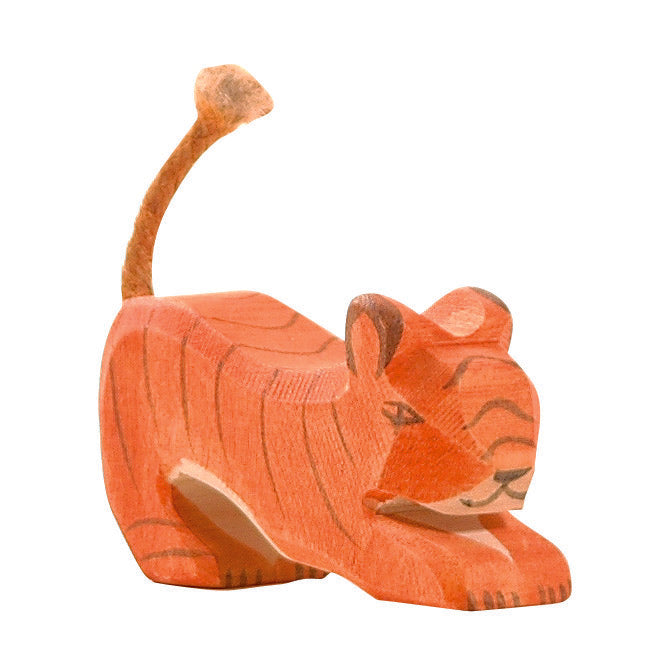 Small wooden Ostheimer tiger figurine in a crouched position, crafted from natural wood, perfect for imaginative play