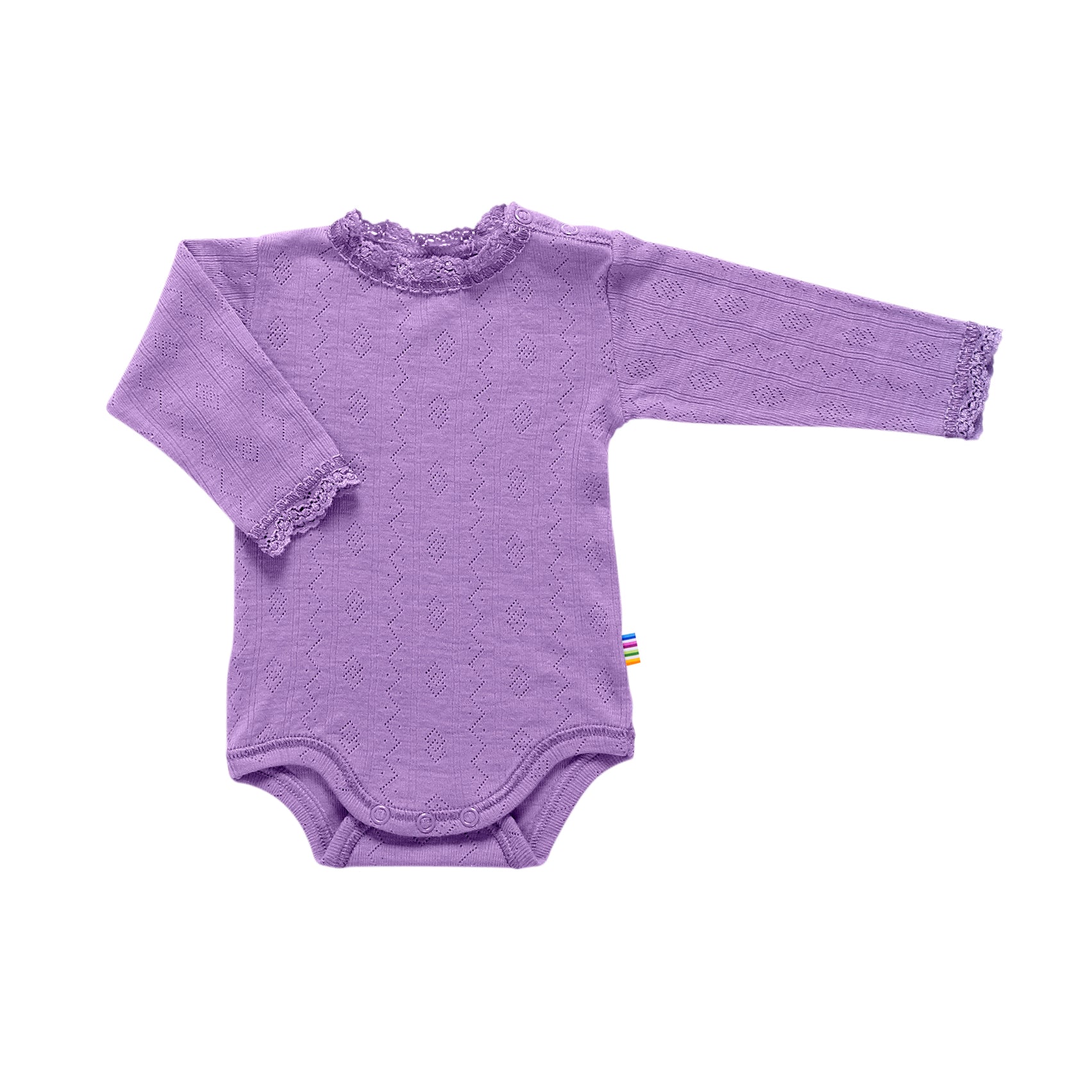 Purple pointelle baby romper made from soft wool and silk – breathable, temperature-regulating knitwear for newborns and infants.
