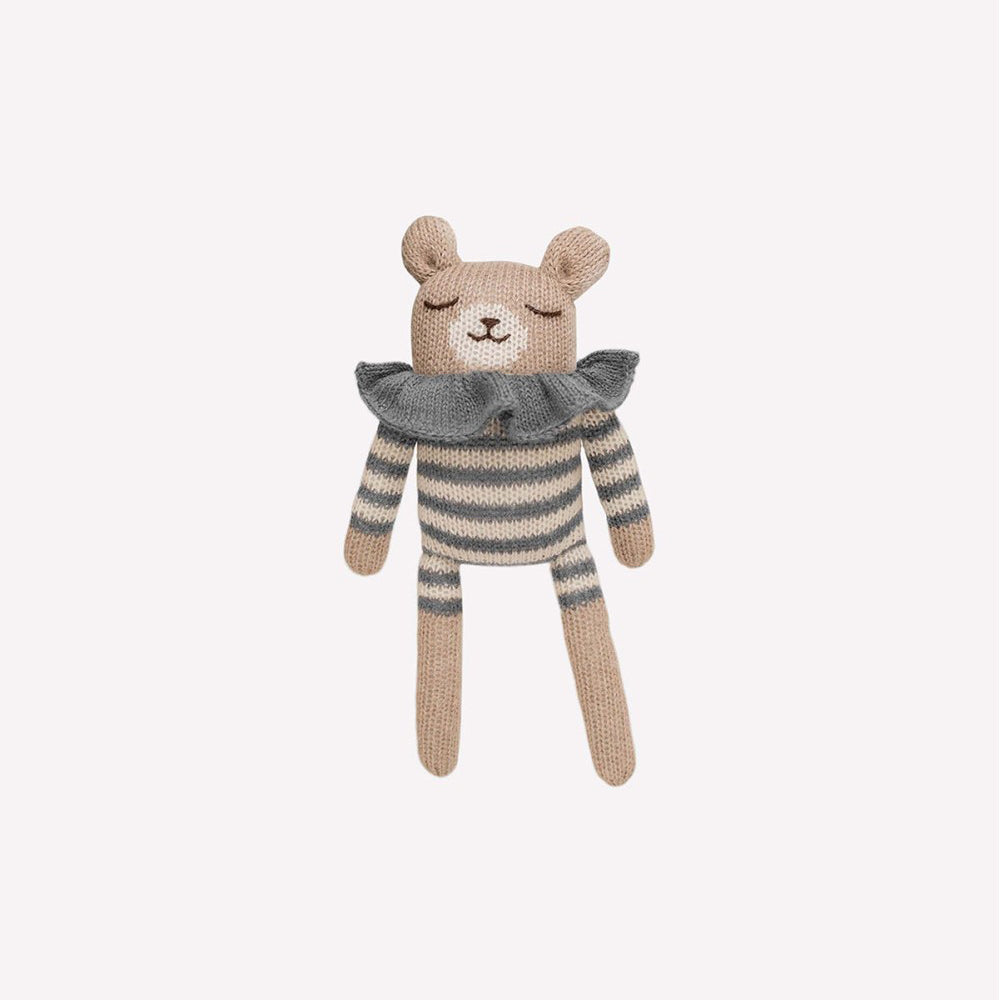 Knitted teddy bear with striped romper and cute collar, hand-knitted in pure baby alpaca wool by Main Sauvage, hypoallergenic and perfect for sensitive skin.