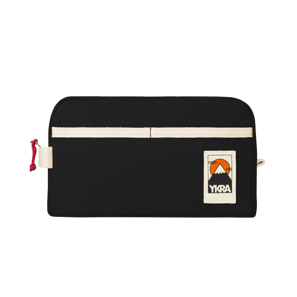 YKRA Dopp Pack toiletry bag made from durable cotton canvas, featuring outer pockets and a carrying handle.
