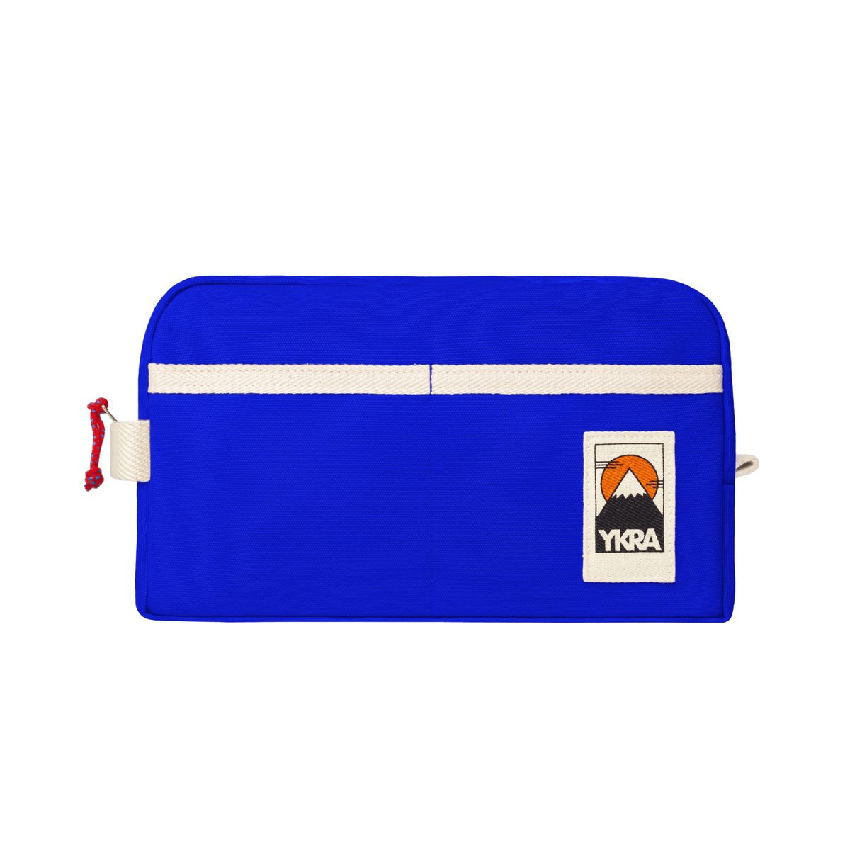 YKRA Dopp Pack toiletry bag made from durable cotton canvas, featuring outer pockets and a carrying handle.