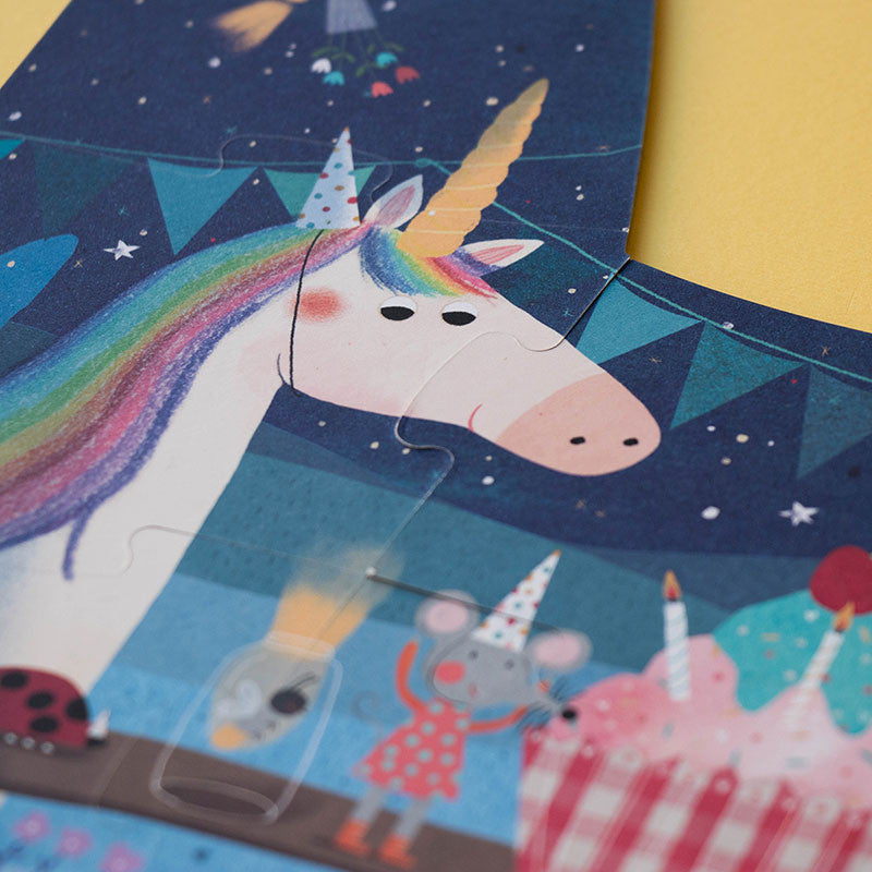 Reversible unicorn-themed birthday puzzle set for kids ages 3+, made from FSC paper and recycled cardboard – progressive puzzles from 2 to 10 pieces