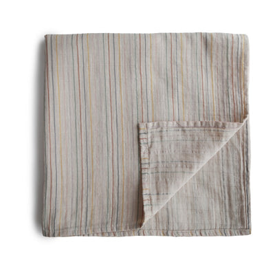 Mushie organic cotton muslin swaddle - soft, breathable baby blanket for swaddling, nursing, and cuddling in color retro stripes